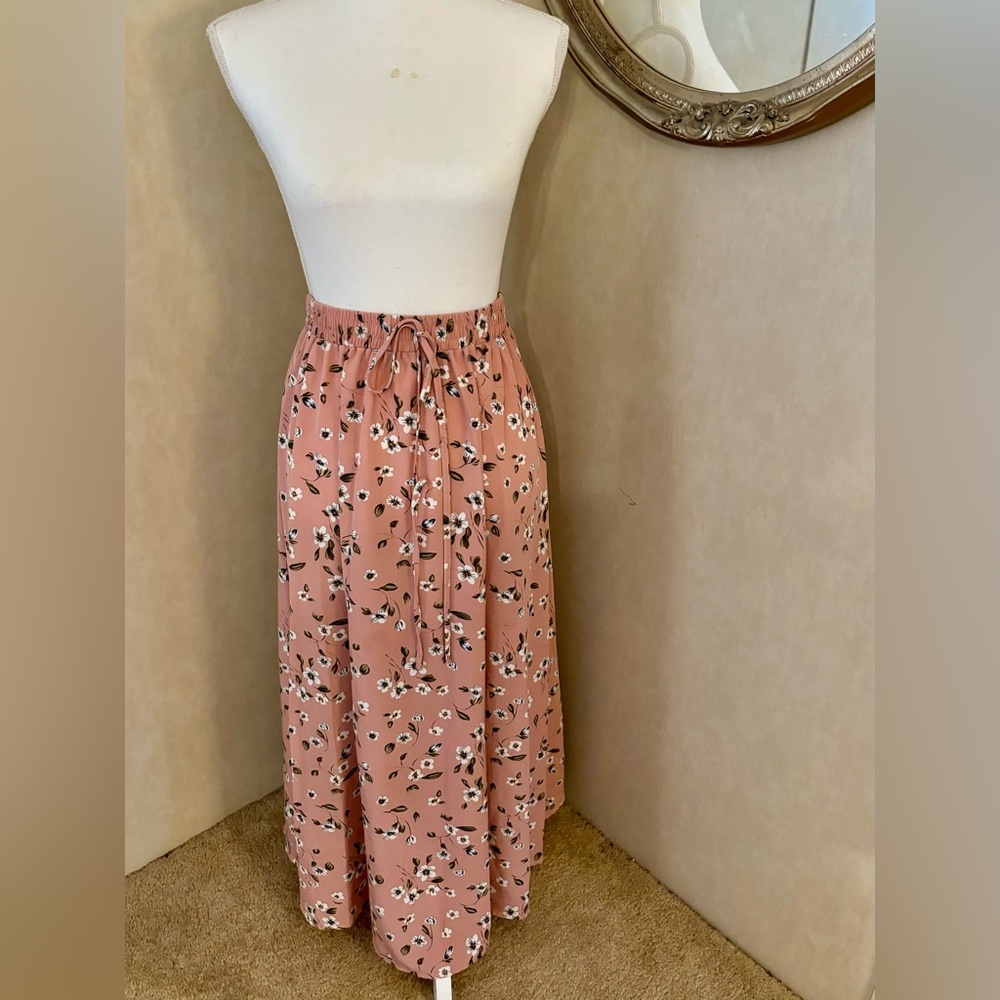 Like new, worn once, Long skirt, elastic waist with draw tie.